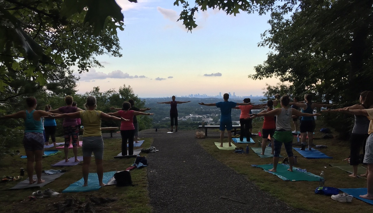 Picture of people doing yoga outdoors on Prospect Hill